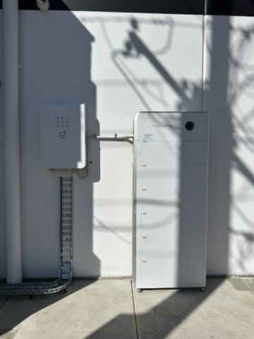 Sigenergy battery and inverter installed on an exterior wall