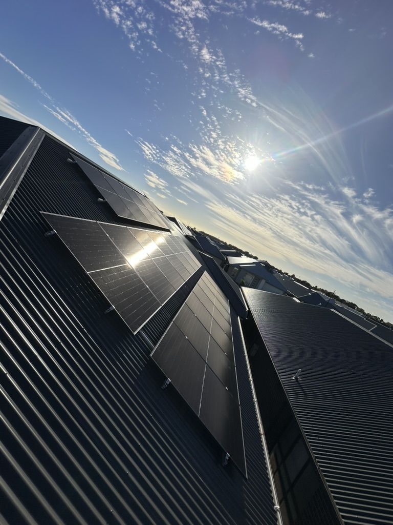 Solar panels on a dark Colorbond roof